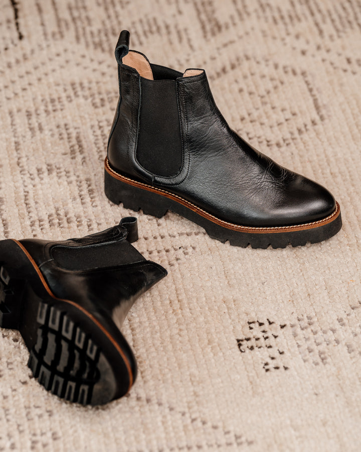 Patricia Green Womenâs Chelsea Lug Sole Bootie in Black